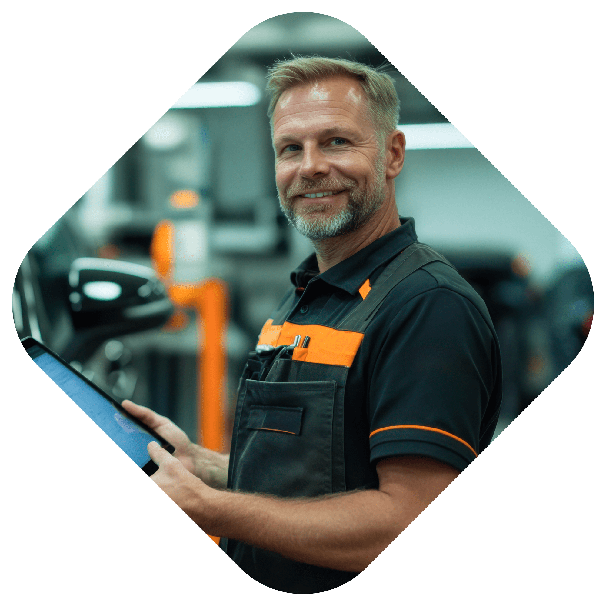 Car mechanic using digital tablet while performing diagnostics in auto repair shop 